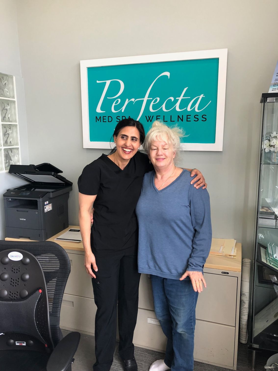 perfecta medspa Bal posing with woman