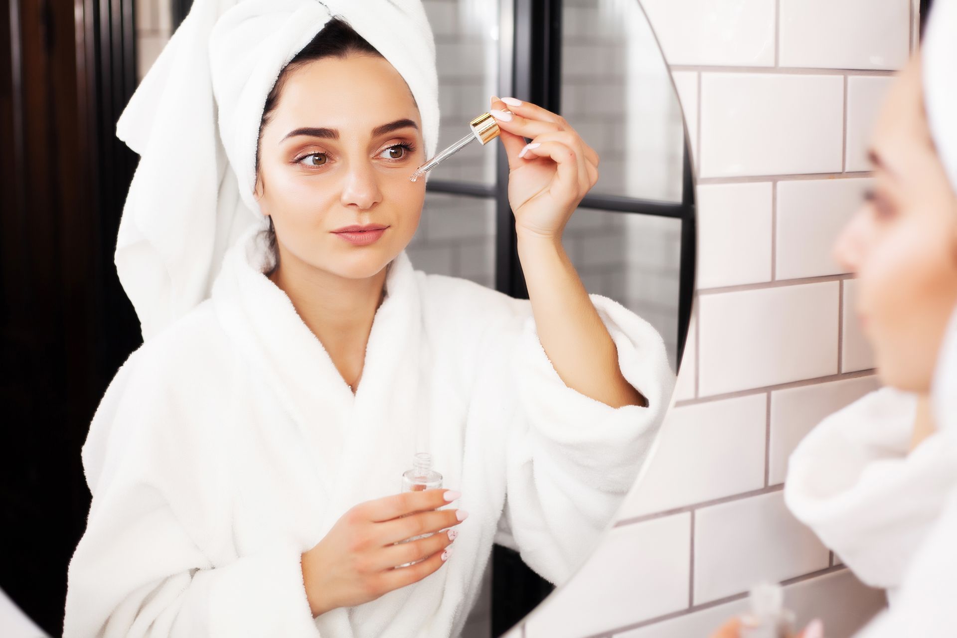 woman applying skincare