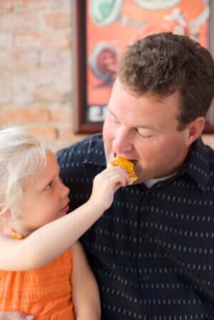 Little Girl Feeding her Dad - Hudson, NH - Wally's Pizza