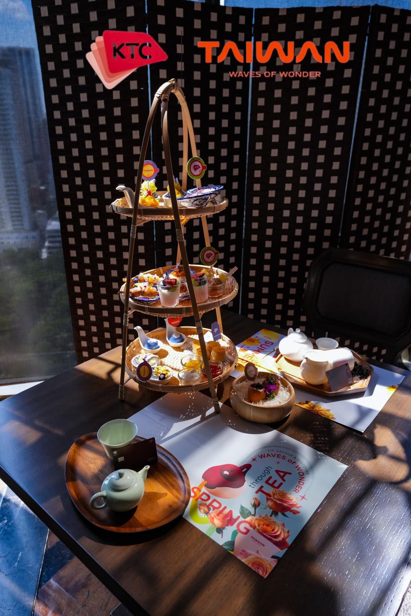 A table with a lot of food on it and a sign that says taiwan