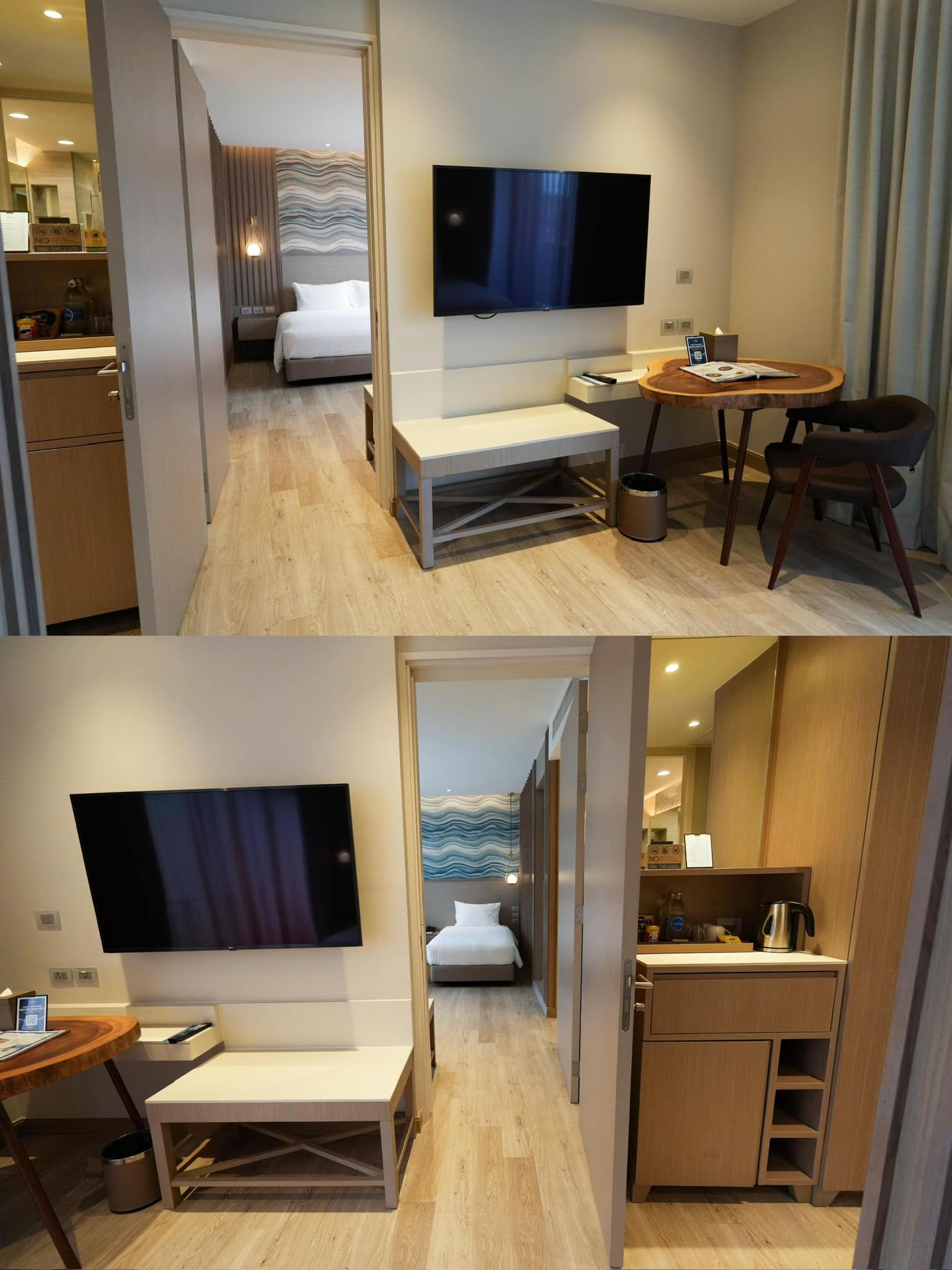 A hotel room with a flat screen tv on the wall