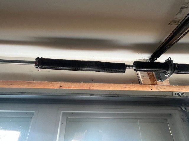 Broken torsion spring replacement in Huntersville