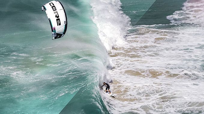 A person is riding a wave on a surfboard in the ocean.