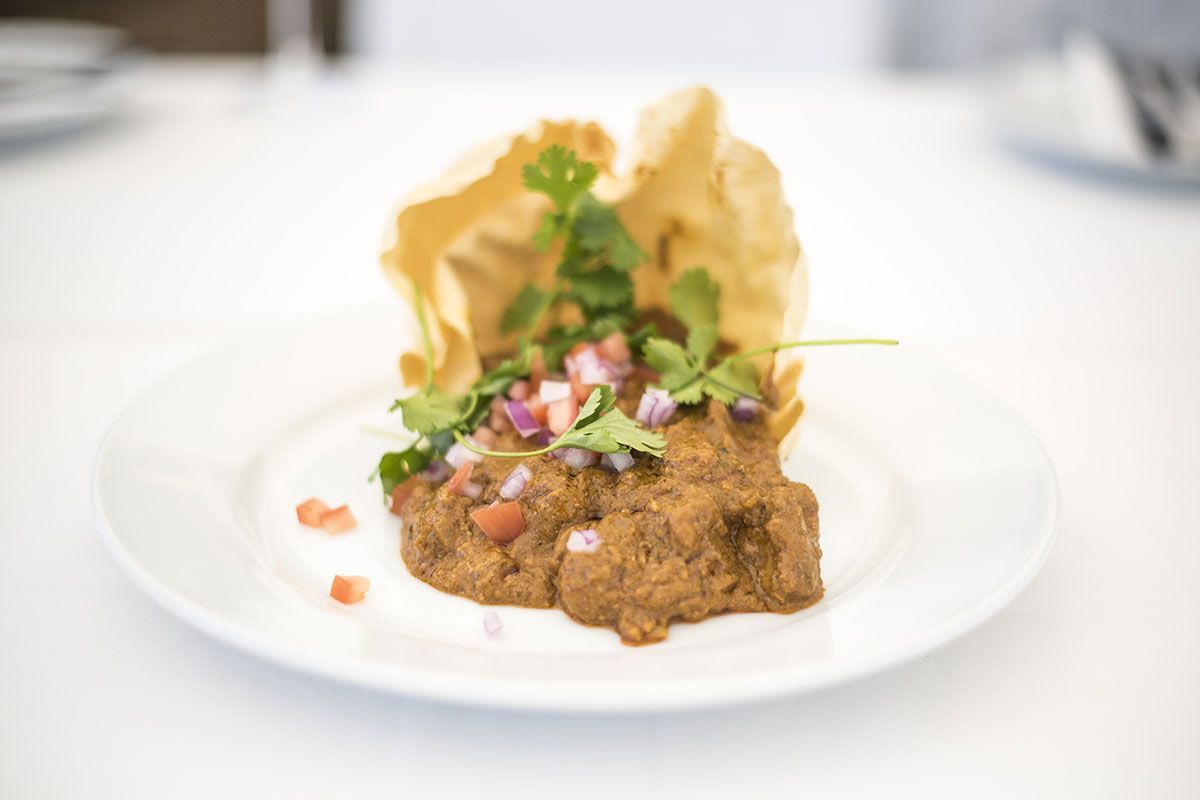 A close up of a plate of food on a table.