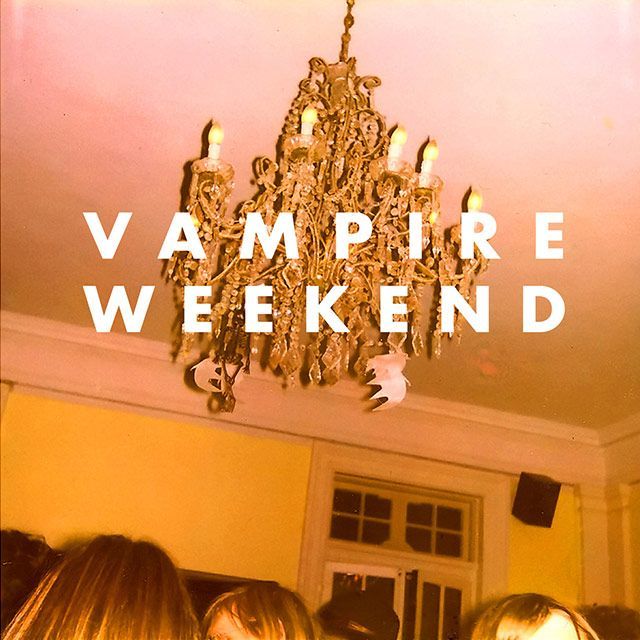 A poster for vampire weekend with a chandelier hanging from the ceiling