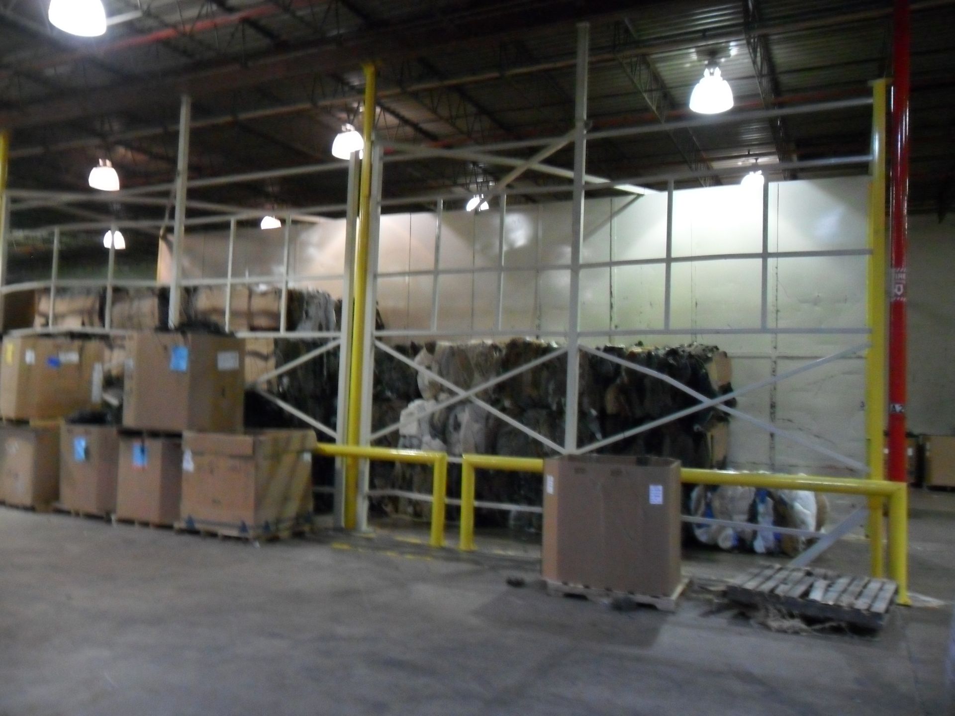 A warehouse filled with lots of boxes and pallets