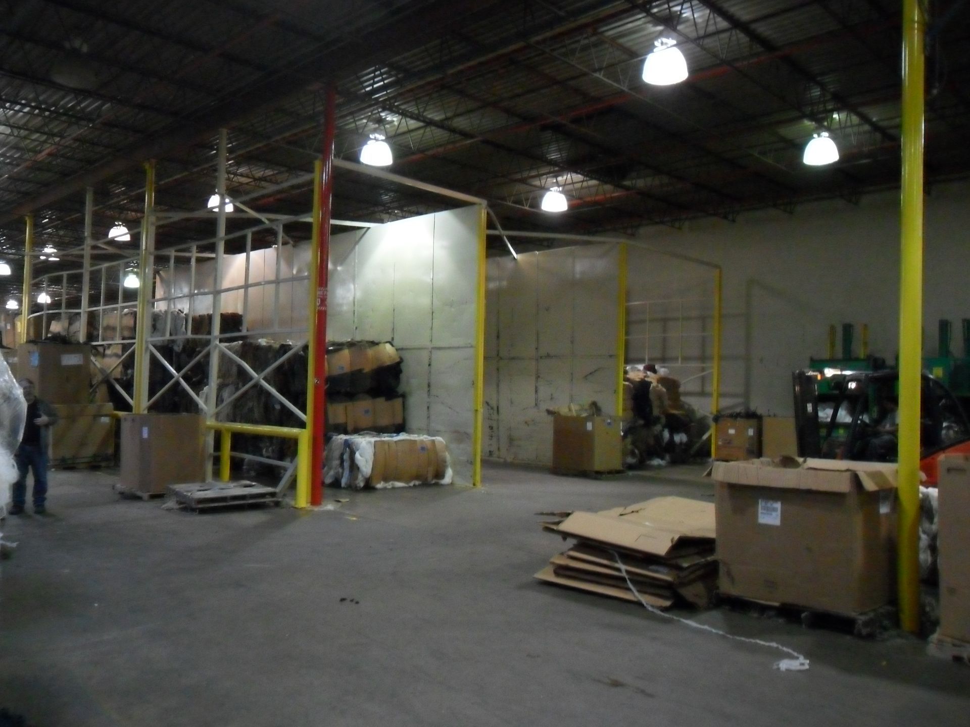 A large warehouse filled with lots of boxes
