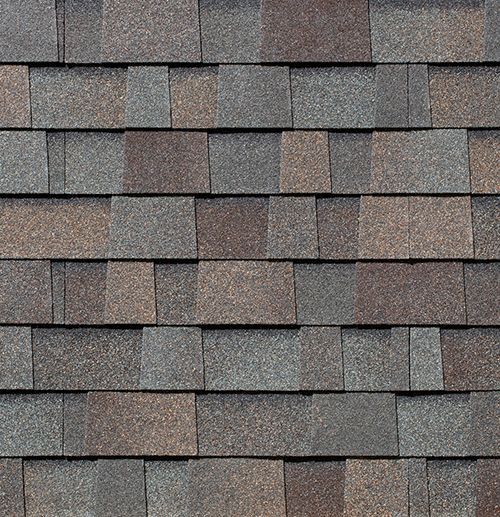 A close up of a row of shingles on a roof.