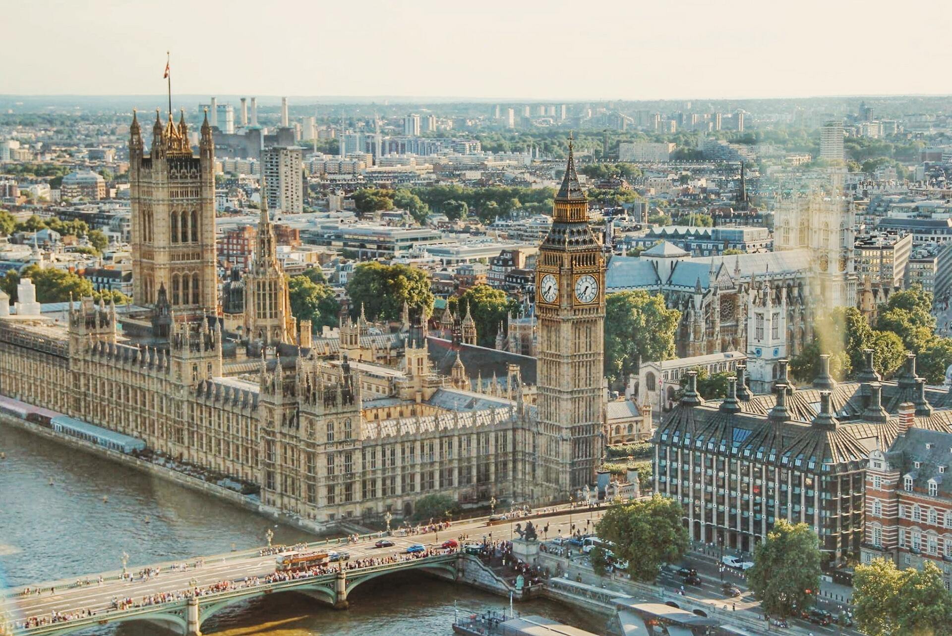 An aerial view of london with big ben and the houses of parliament.