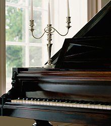 candle stand on a piano