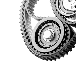 Close-up of interlocking metal gears and toothed wheels on a white background