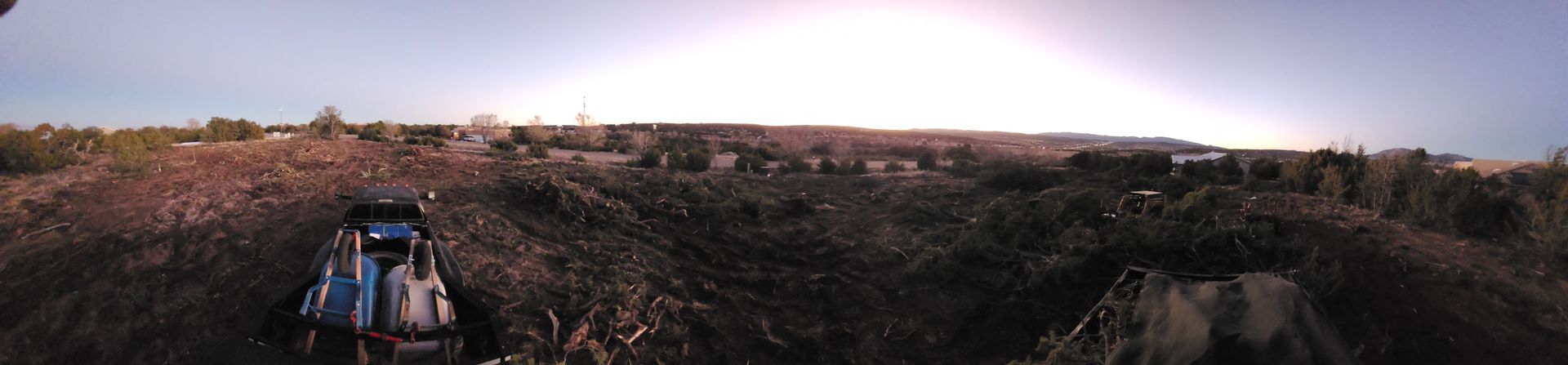 A blurry picture of a person riding a bike in a field.