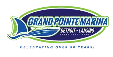 A logo for grand pointe marina detroit lansing celebrating over 50 years