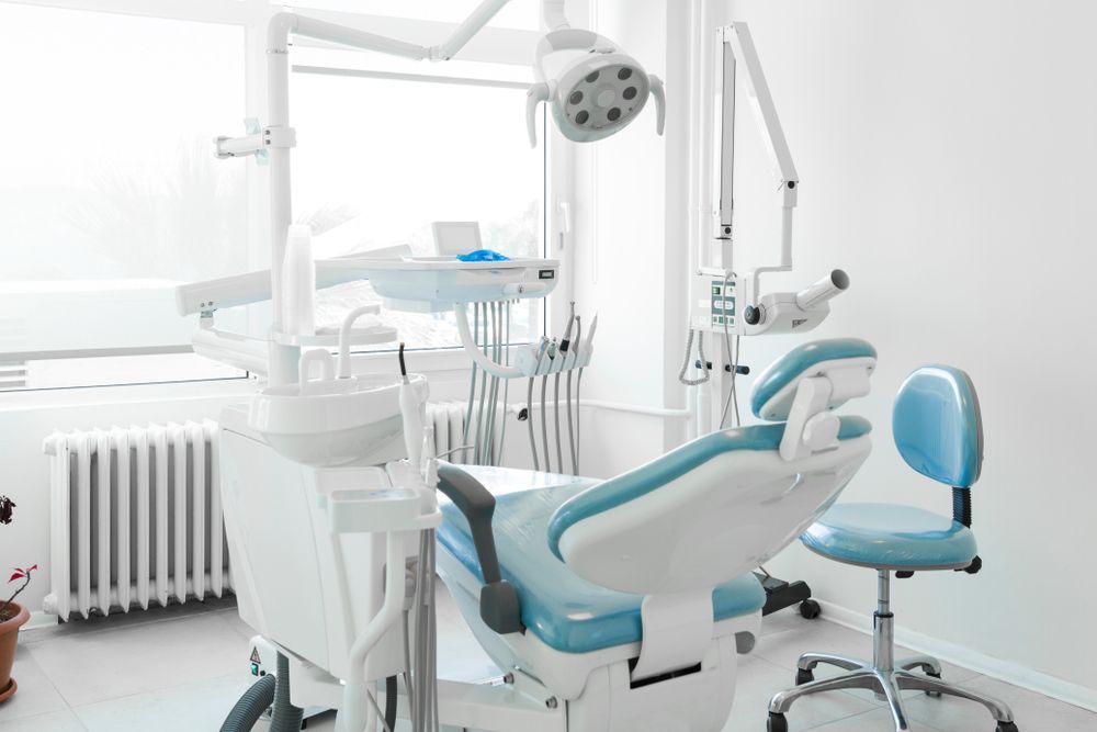 There Is A Dental Chair In The Dental Office — Cairns Precision Dental Group In Woree, QLD