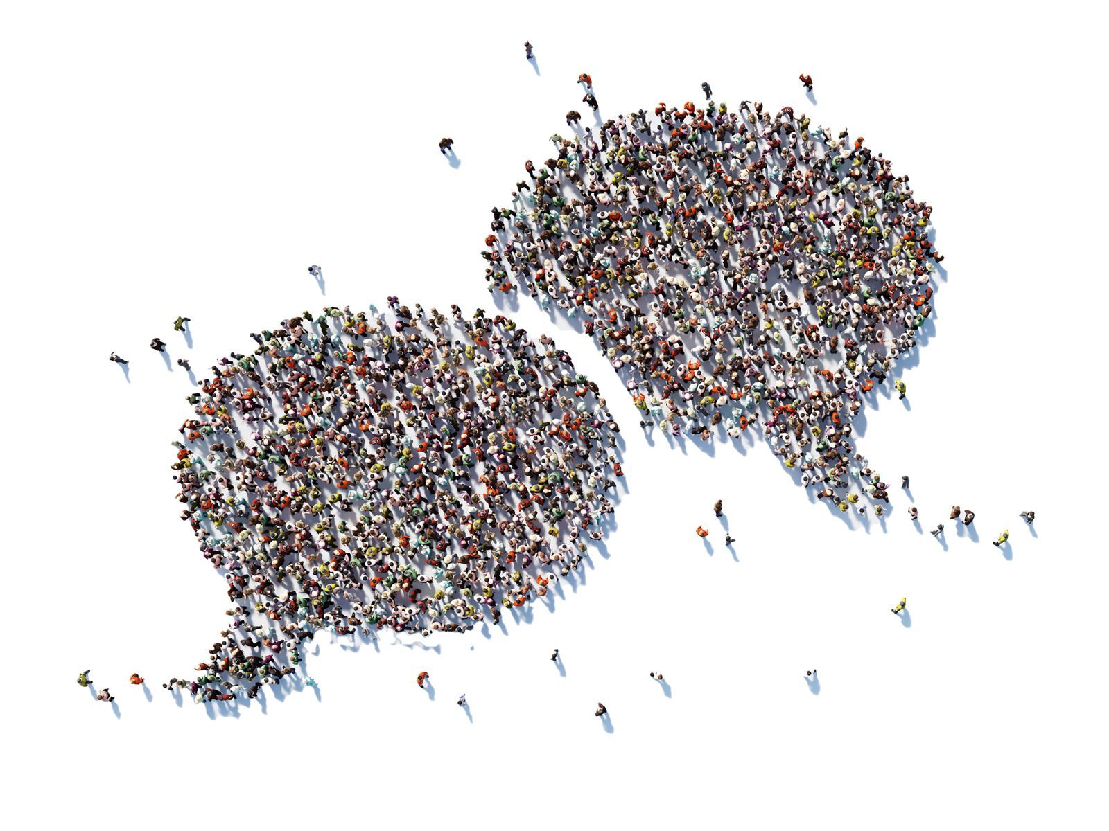 A large group of people are gathered together in the shape of speech bubbles