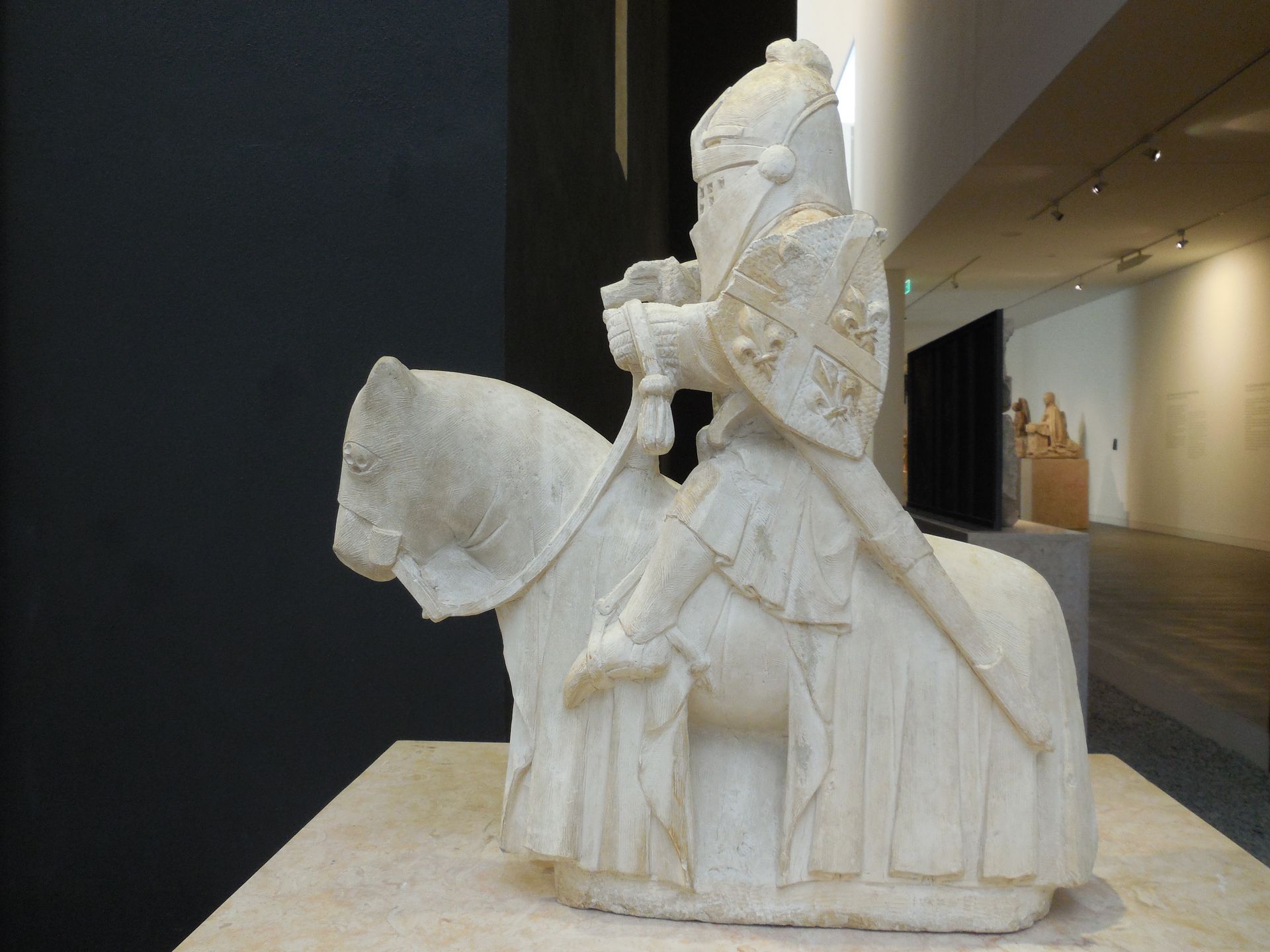Limestone statue of a knight from the 14th century likely carved by the famed Pero. It is in the Coimbra Museum.