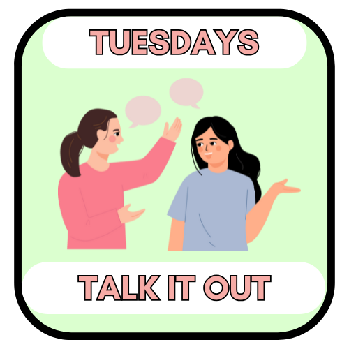 Two women talking, one gesturing. 