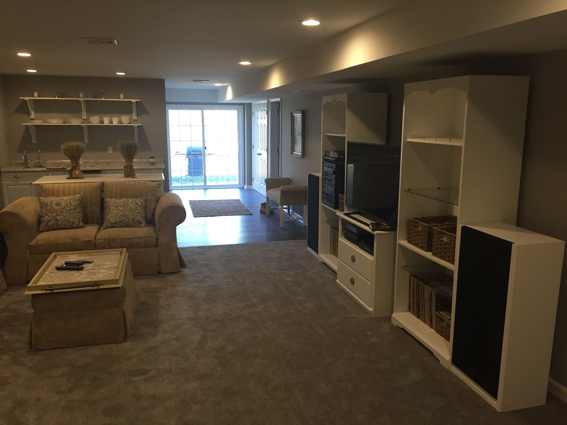 A living room with a couch and a television