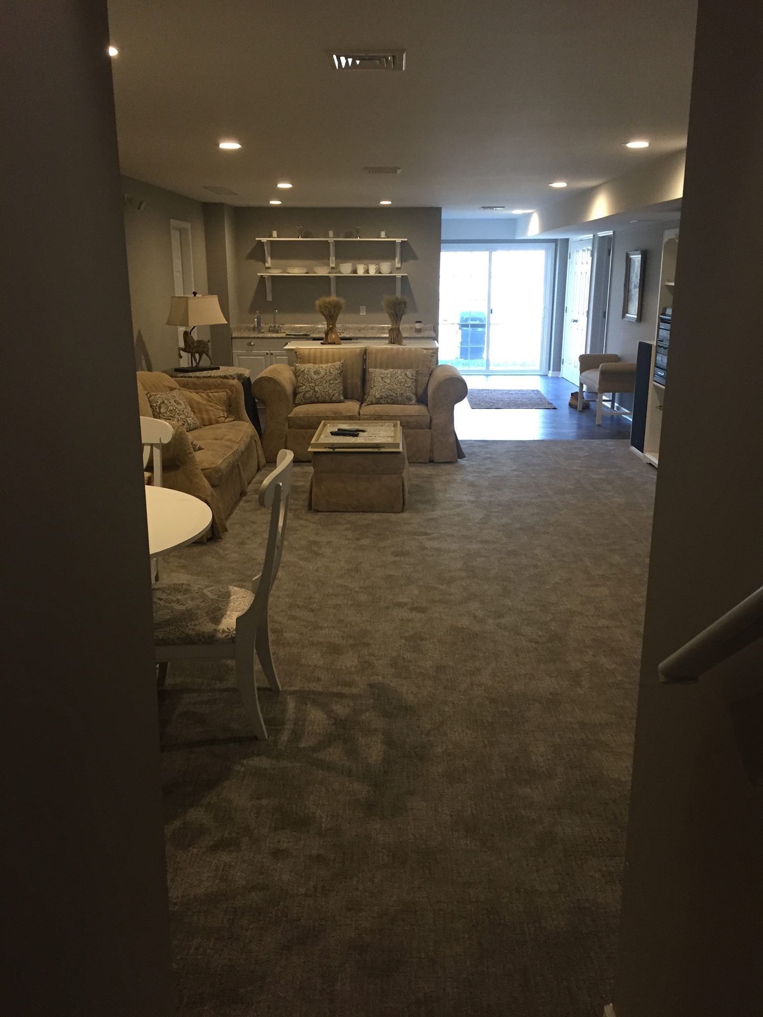 A living room with a couch and a table