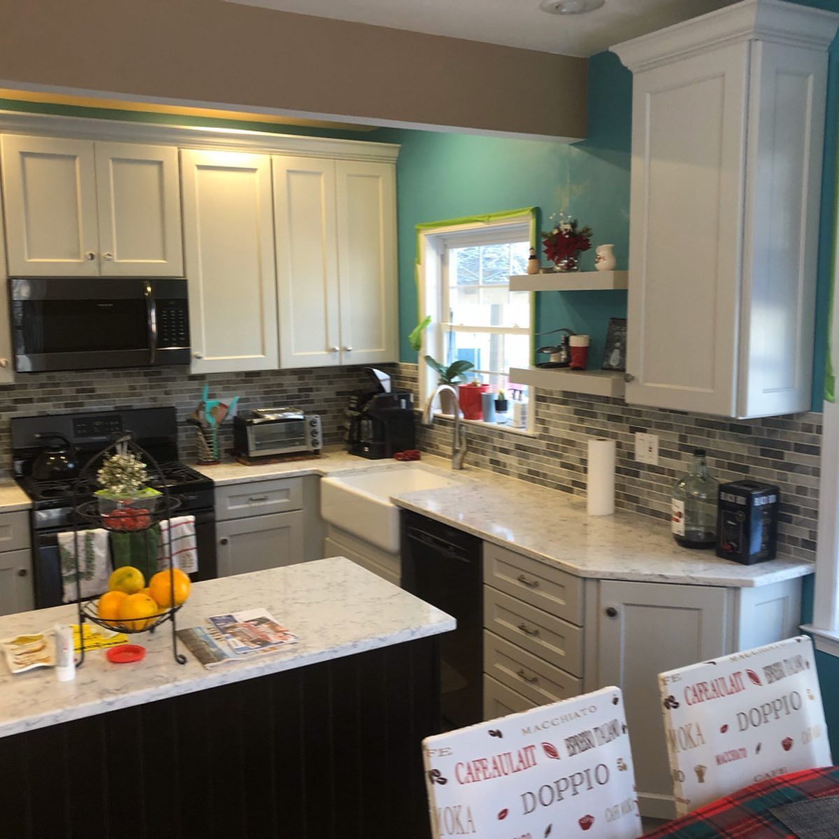 A kitchen with a sign that says doppio on it