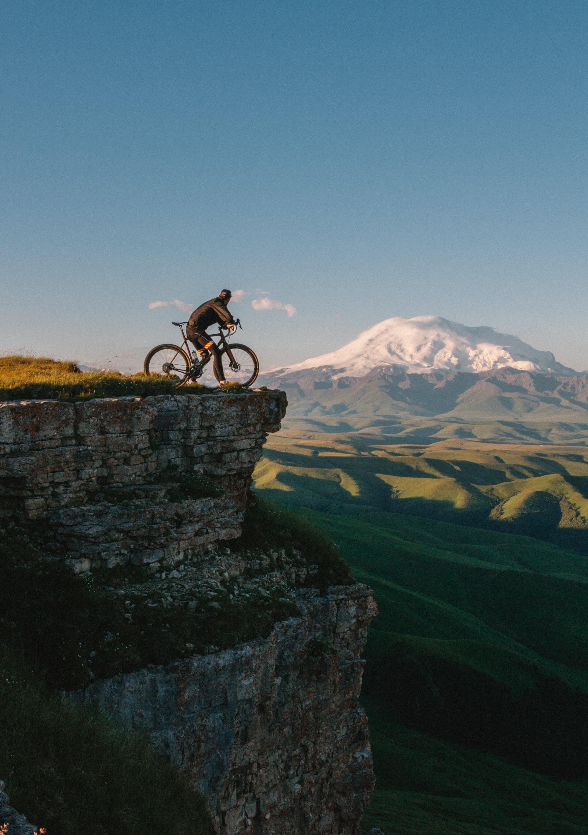 Man looking out over a cliff