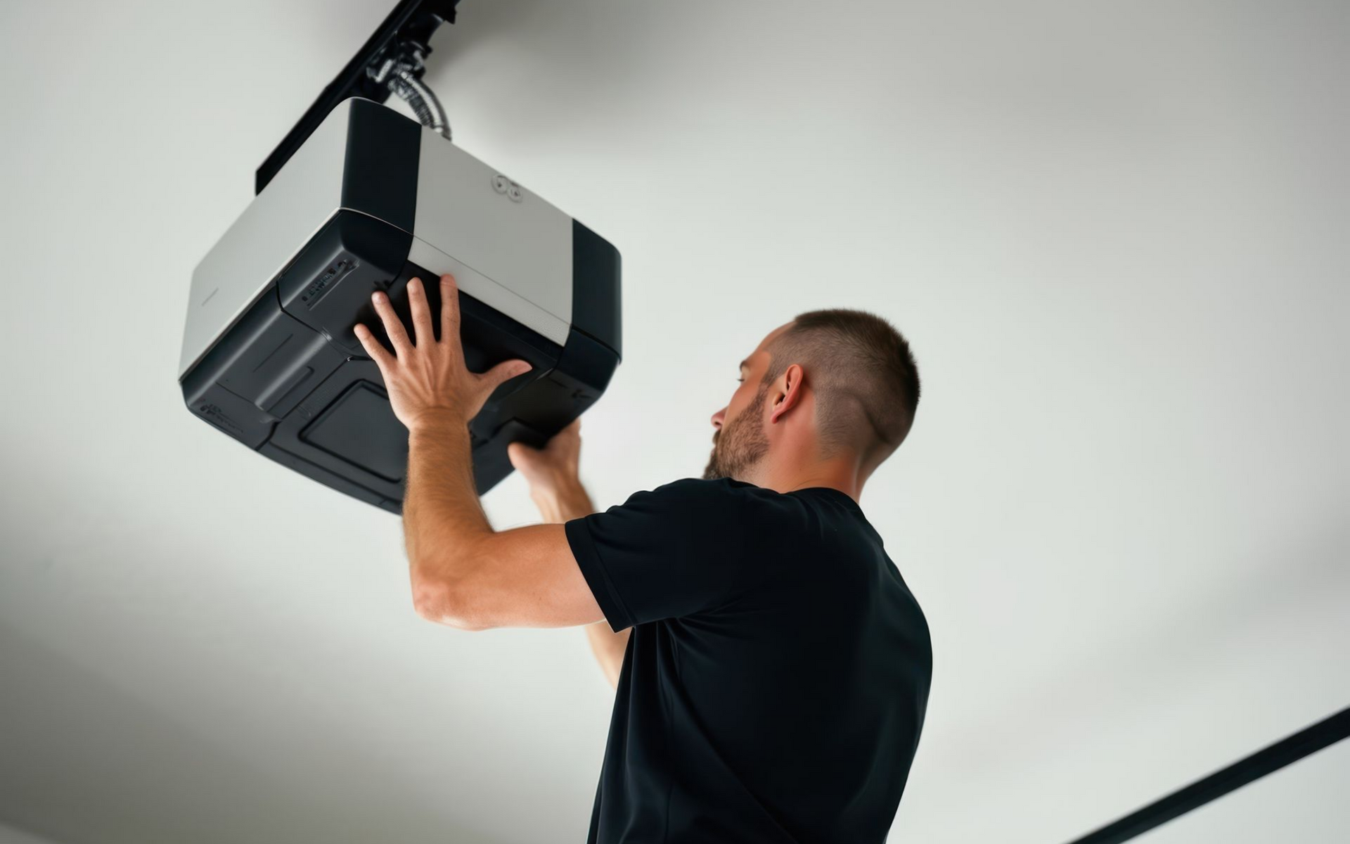 A professional technician on a ladder performing garage door motor work for a home installation.