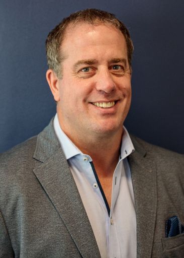 Jason Clifford chats with Jill Clifford in FreightPlus Office