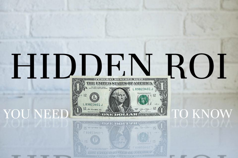 Dollar bill on reflective surface