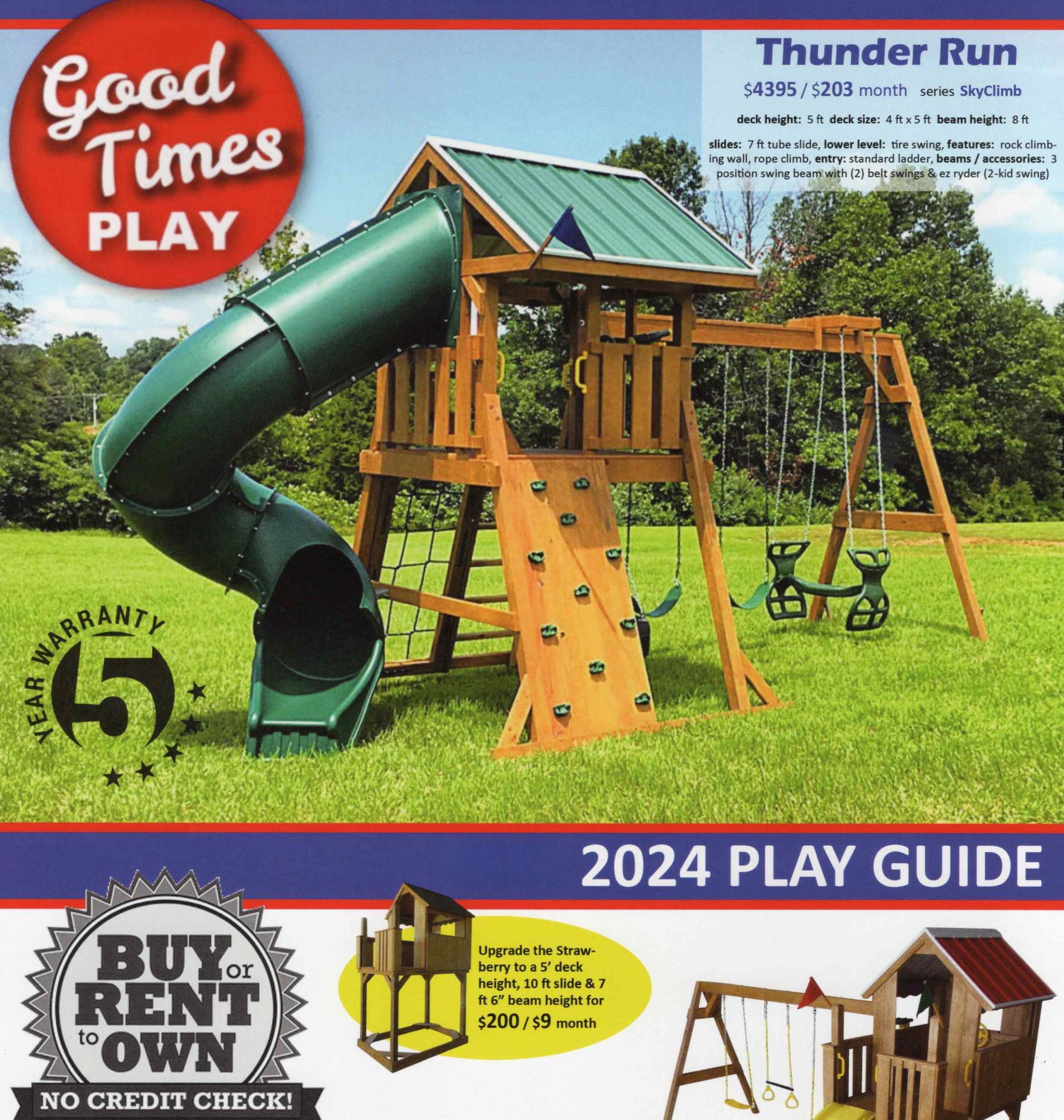 Playground set with slide, swings, climbing wall.