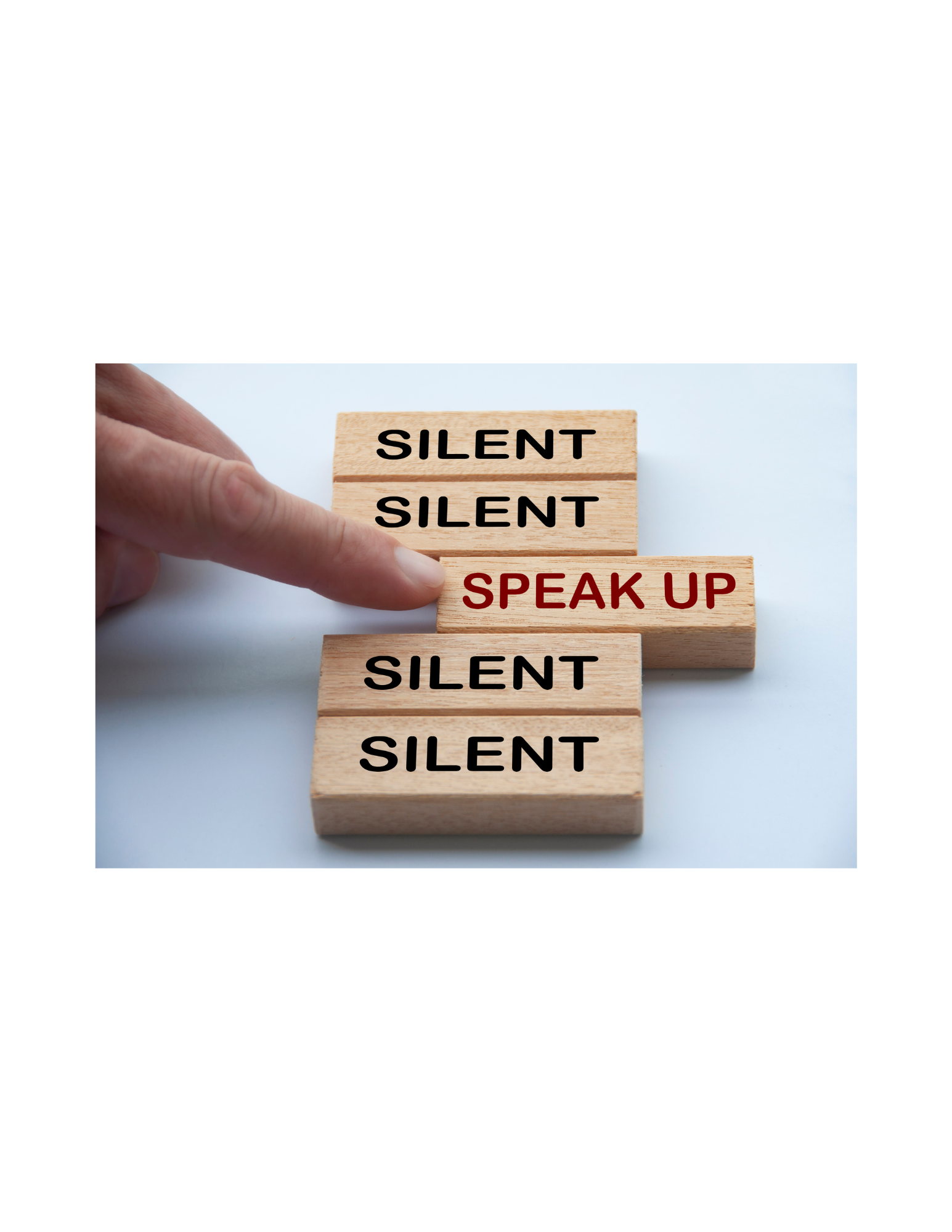 A person is pointing at a wooden block that says speak up