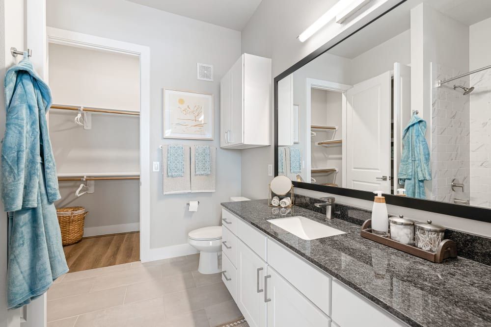 Modern Bathroom with Walk In Closet at The Avery