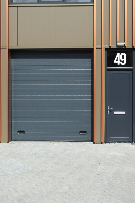 A garage door with the number 49 on it
