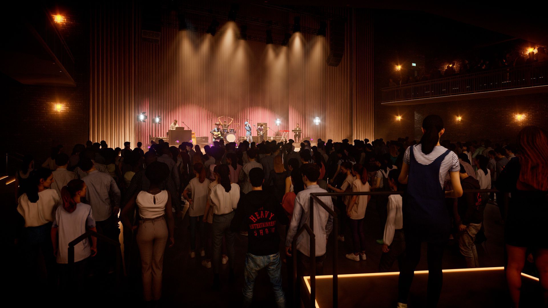 Audience at a concert venue, watching performers on stage under bright lights. Dim room with many people.