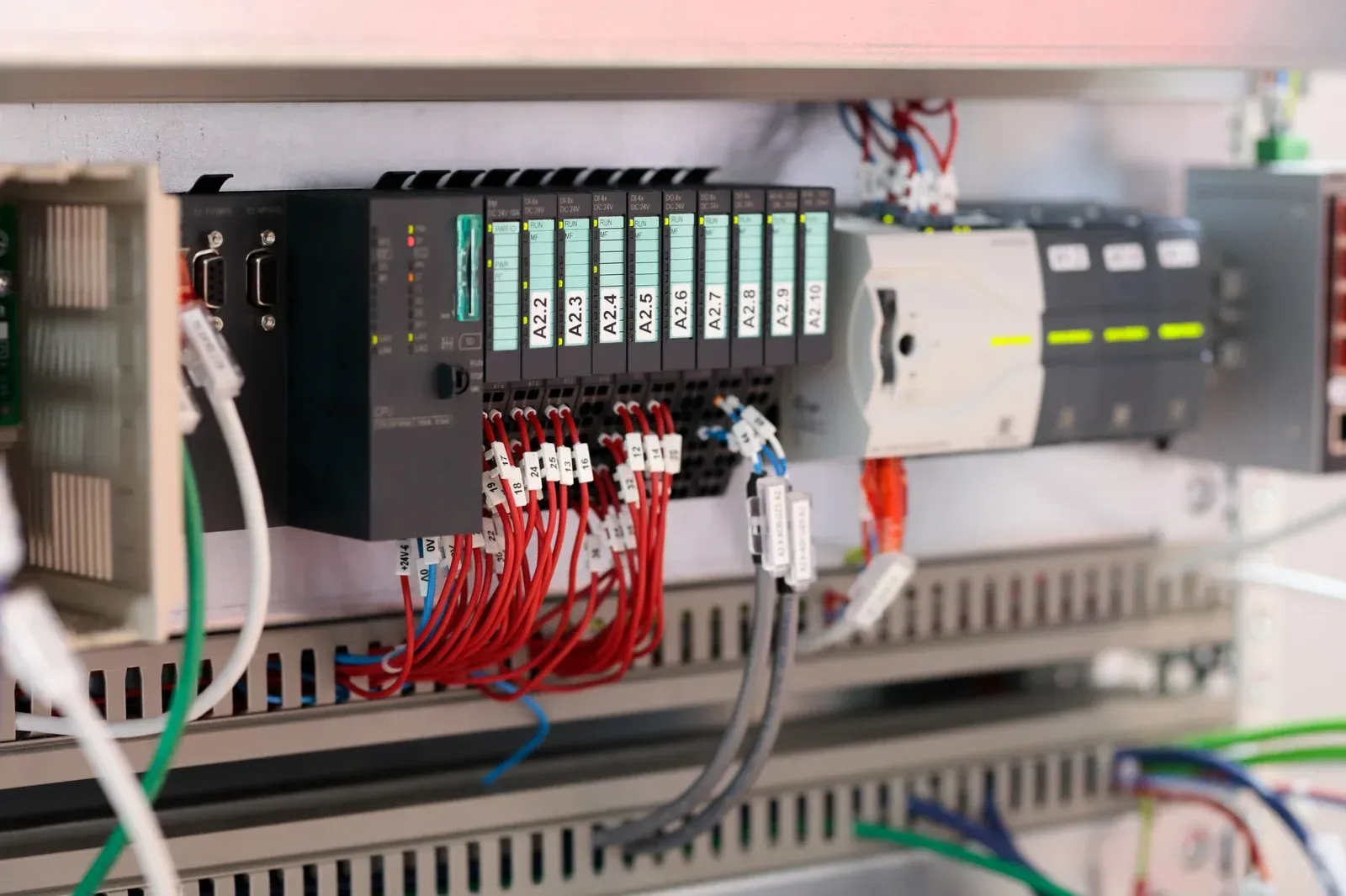 PLC control panel with wired modules.