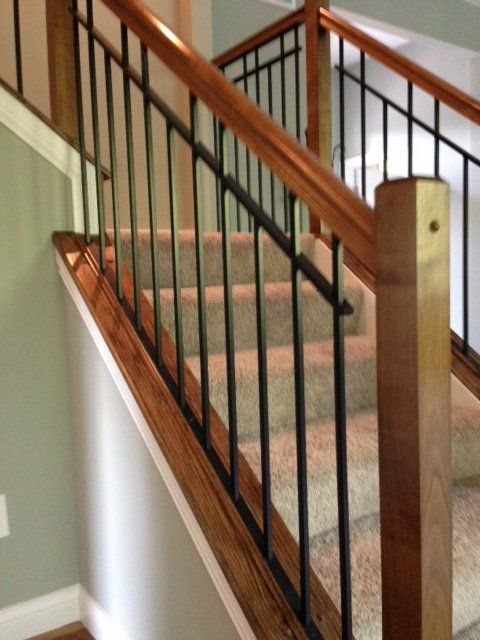Wooden stair case railing installed in Cleves, OH