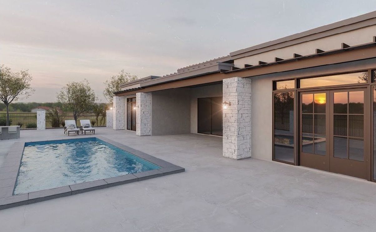 A large house with a swimming pool in front of it.