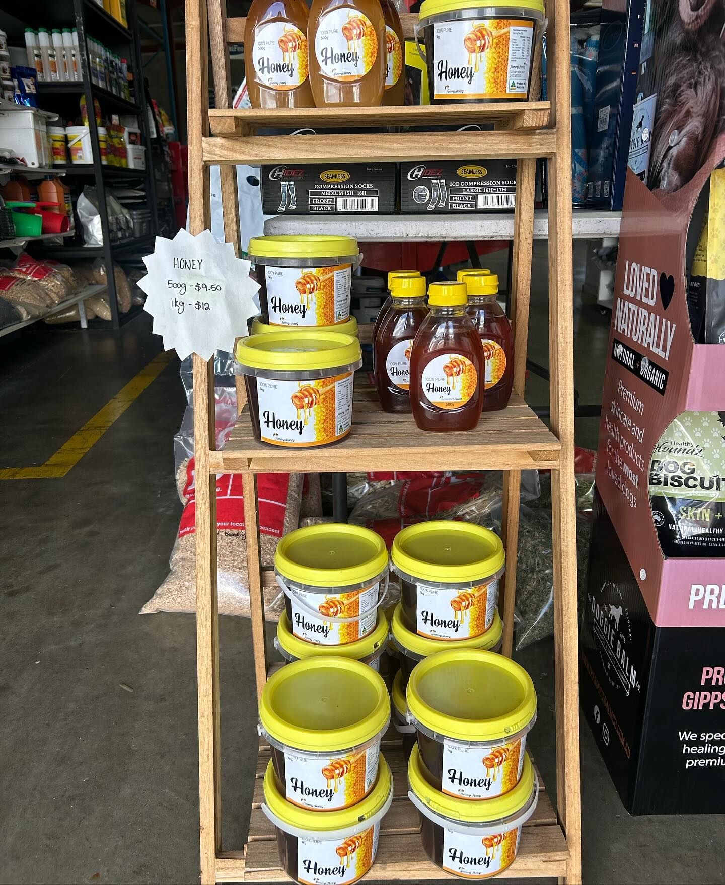 Wooden Shelf Displays Honey Jars — North Coast Stock Feeds in Ballina, NSW