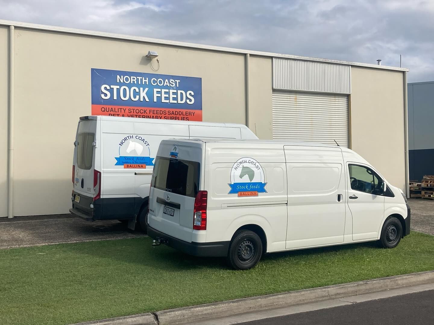 Two White North Coast Stock Feeds Vans — North Coast Stock Feeds in Byron Bay, NSW