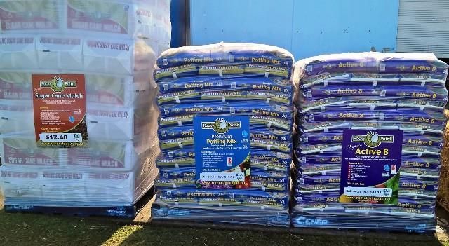 Pallets of Bagged Feed: Apple Crisp & Amino-2 Labels — North Coast Stock Feeds in Ballina, NSW