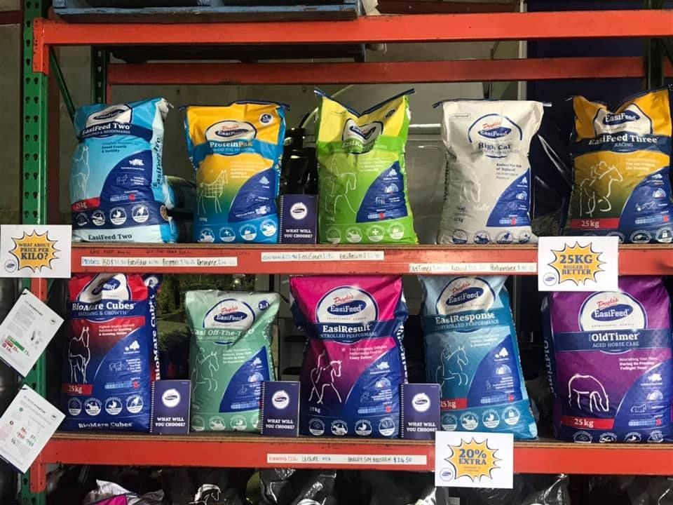 Shelves of Colorful Pet Food Bags, Various Sizes and Brands — North Coast Stock Feeds in Ballina, NSW