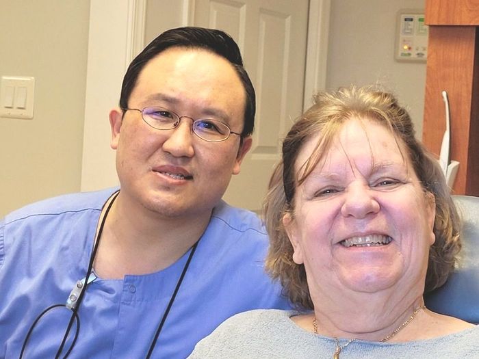 Braddock Family Dental - Dr. Cho with Happy Patient