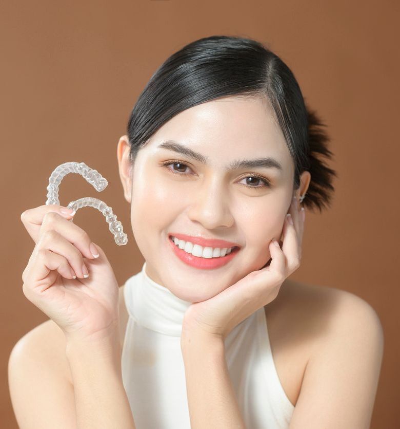 Lady smiling with invisalign
