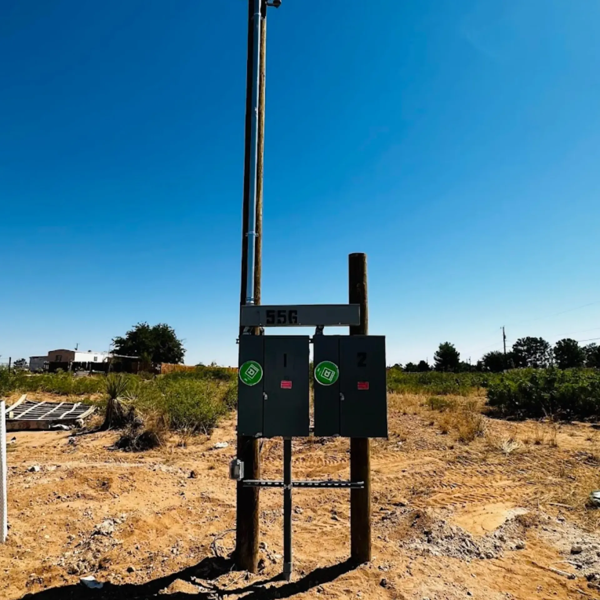 Maese Solutions  Electric  Plumbing  HVAC - A 2 meter base on pole with a sign that says 916 on it