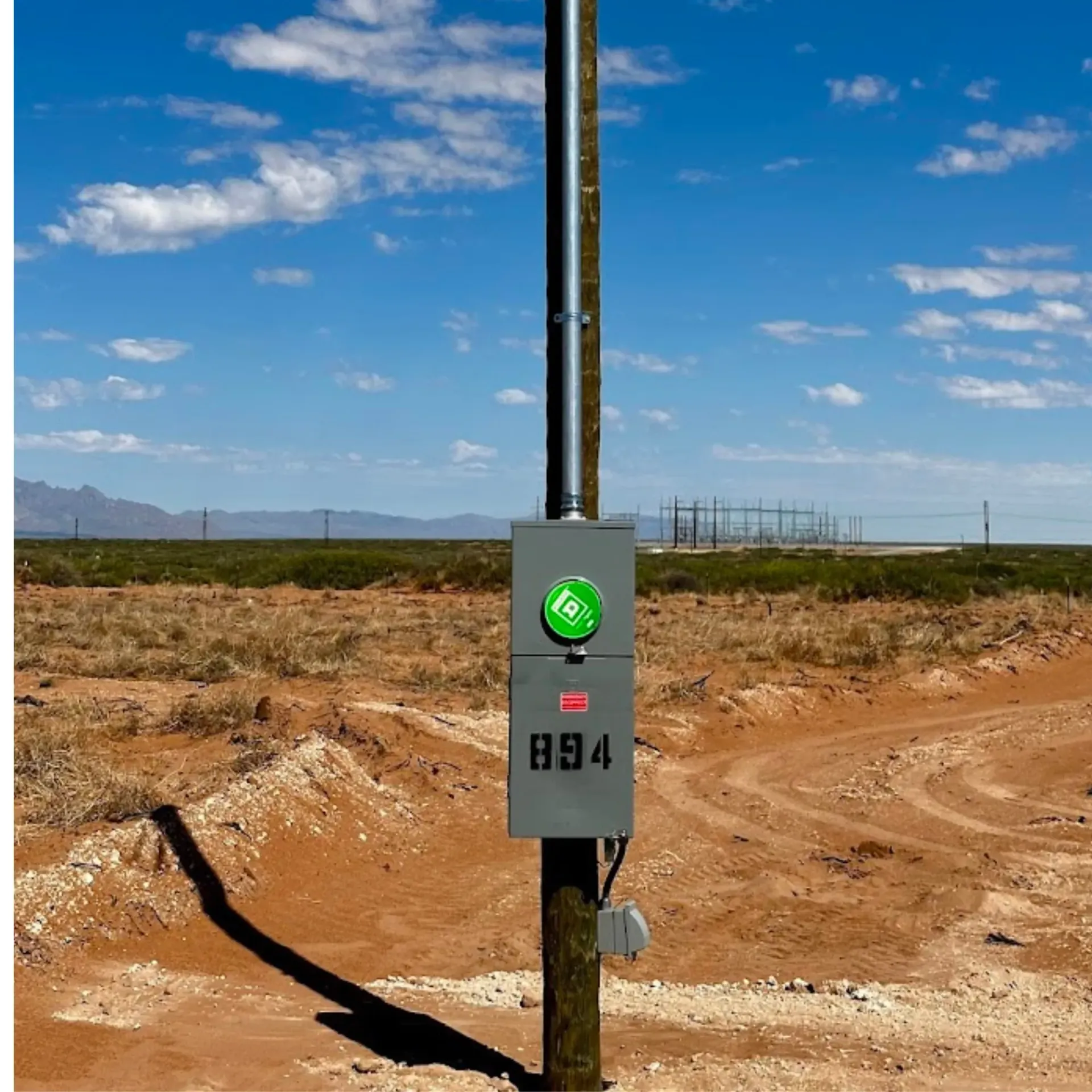 Maese Solutions  Electric  Plumbing  HVAC - A mater base box on a pole with the number b94 on it