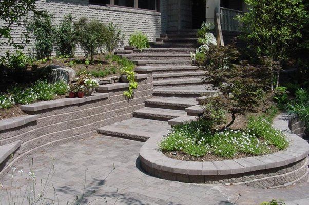 Stone Stairs Leading To House Entrance With Nice Hardscaped Land — Virginia Beach, VA — Gentle Rain