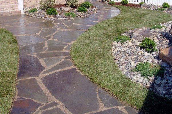 Closeup Of Frontyard With Nice Hardscaped Land — Virginia Beach, VA — Gentle Rain