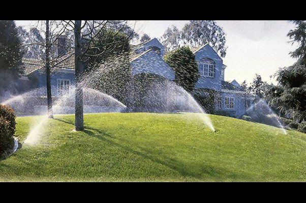 Multiple Sprinklers Spraying Water On Grass — Virginia Beach, VA — Gentle Rain