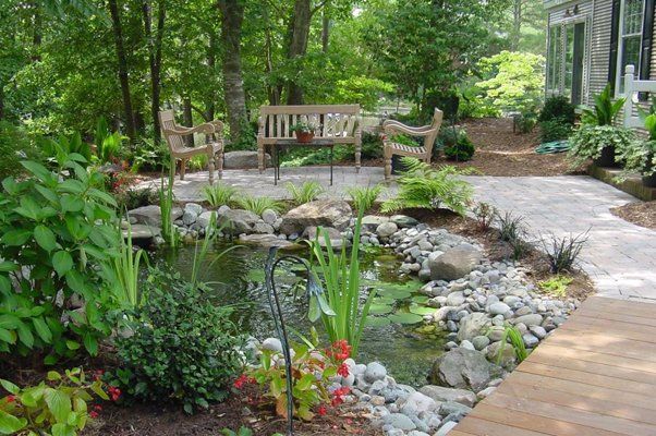 Wooden Benches And Stones Next To Small Pond — Virginia Beach, VA — Gentle Rain