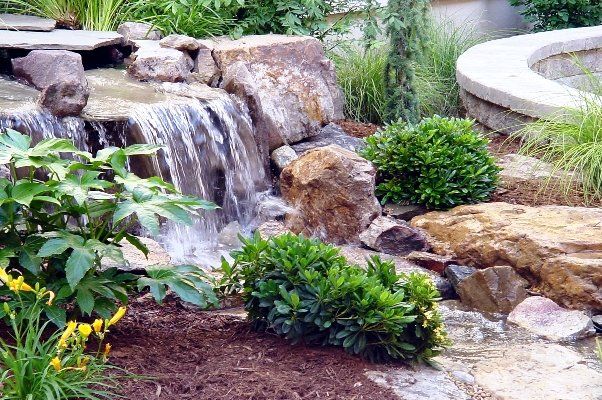Water Fall Next To Large Stones And Lush Bushes — Virginia Beach, VA — Gentle Rain