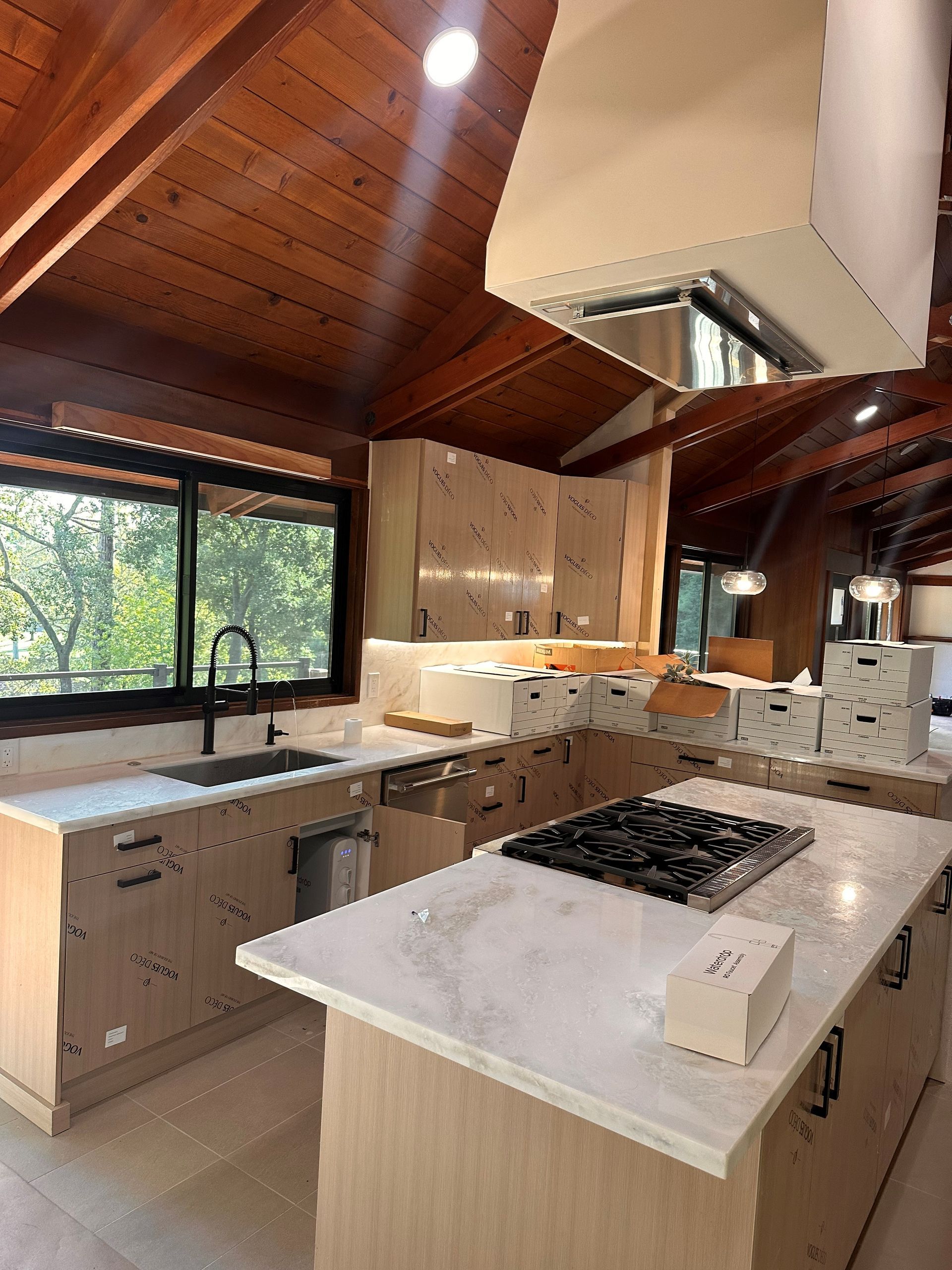A plumber hands fixing sink